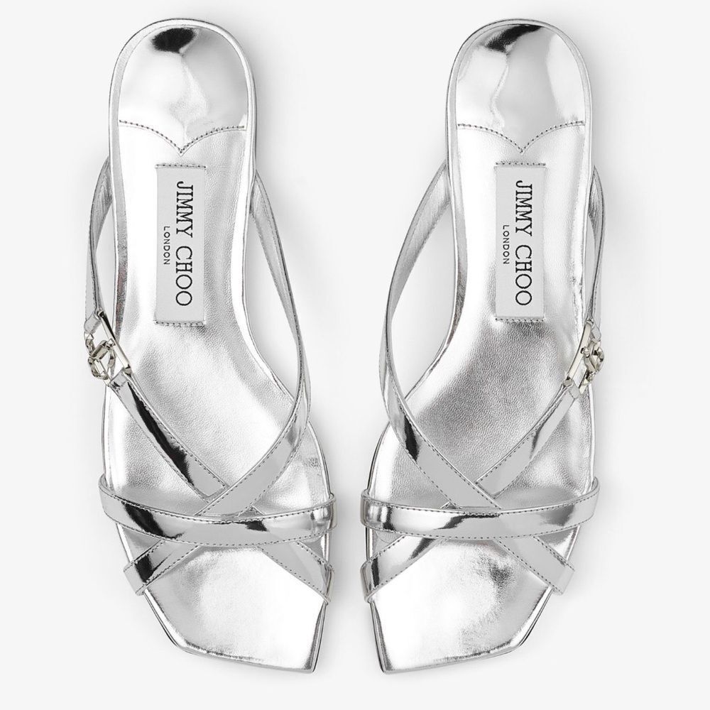 JIMMY CHOO
Jess Flat Silver Liquid Metal Leather Flat Sandals
